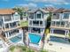 Aerial view of upscale houses featuring private pools and Mediterranean-style architecture at 7613 Toscana Blvd, Orlando, FL 32819