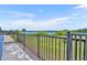 A stunning backyard with a view of a lake in the distance at 7613 Toscana Blvd, Orlando, FL 32819