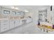 Elegant bathroom featuring double sinks, modern lighting, and a clear view of the shower at 7613 Toscana Blvd, Orlando, FL 32819