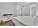 Clean bedroom space with wood floors and multiple entry doors for convenience at 7613 Toscana Blvd, Orlando, FL 32819