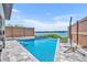 A stunning backyard pool offers a tranquil outdoor space with amazing views of the lake at 7613 Toscana Blvd, Orlando, FL 32819
