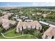 Expansive aerial view of the BellaTrae community, surrounded by lush landscapes, ponds, and nature at 8296 Portofino Dr # 103, Davenport, FL 33896