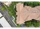 Overhead aerial view of the community building showing a durable tile roof and well manicured landscaping at 8296 Portofino Dr # 103, Davenport, FL 33896