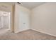 Carpeted bedroom featuring a closet with double doors and a bright window at 8296 Portofino Dr # 103, Davenport, FL 33896