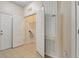 Laundry room area featuring tile floors and closet with hookups at 8296 Portofino Dr # 103, Davenport, FL 33896