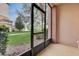 Enclosed patio provides views of the grounds, fountain, and nearby building at 8296 Portofino Dr # 103, Davenport, FL 33896