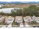 A beautiful aerial view of the home's neighborhood and its proximity to ponds, lakes, and nature at 8972 Sonoma Coast Dr, Winter Garden, FL 34787