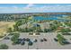 Aerial view of the community, showcasing its lush landscaping, lakes, and amenities at 8972 Sonoma Coast Dr, Winter Garden, FL 34787