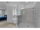 Bathroom with a glass-enclosed shower, soaking tub, and neutral tile design at 8972 Sonoma Coast Dr, Winter Garden, FL 34787