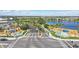 Entrance to the community, showcasing lush landscaping and water features, creating a welcoming ambiance at 8972 Sonoma Coast Dr, Winter Garden, FL 34787