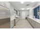 Kitchenette featuring stainless steel appliances, sleek cabinets, and ample counter space at 8972 Sonoma Coast Dr, Winter Garden, FL 34787
