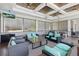 Relaxing outdoor lounge area with comfortable seating and stylish decor overlooking the grounds at 8972 Sonoma Coast Dr, Winter Garden, FL 34787