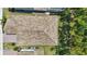 Aerial view of a home's roof showing its architectural style and color at 8972 Sonoma Coast Dr, Winter Garden, FL 34787
