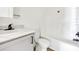 Bathroom features a shower-tub combo, modern fixtures, and vanity at 9055 Atlas Dr, St Cloud, FL 34773