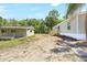 Exterior view of home with a detached garage at 9055 Atlas Dr, St Cloud, FL 34773