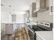 Modern kitchen featuring granite countertops and stainless steel appliances at 9055 Atlas Dr, St Cloud, FL 34773