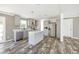 Bright kitchen with gray cabinetry, stainless appliances, and modern island at 9055 Atlas Dr, St Cloud, FL 34773
