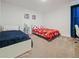 bedroom with twin beds and carpeted floor at 9084 Sommerset Hills Dr, Davenport, FL 33896