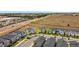 An aerial view of modern homes in a neatly planned community with open spaces and paved roads at 9084 Sommerset Hills Dr, Davenport, FL 33896
