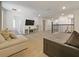 Spacious loft features neutral carpeting, light walls, and a comfortable seating area at 9084 Sommerset Hills Dr, Davenport, FL 33896