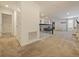 Hallway in the loft featuring black railings, plush carpet, and neutral walls at 9084 Sommerset Hills Dr, Davenport, FL 33896