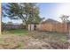 Backyard featuring a wood fence and a shed at 9447 Dearmont Ave, Orlando, FL 32825