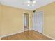 Comfortable bedroom with hardwood floors and a closet for ample storage at 1001 Dora Ave, Tavares, FL 32778