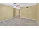 Open-concept living area with tile flooring flowing seamlessly into adjacent rooms at 1001 Dora Ave, Tavares, FL 32778