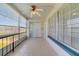 Relaxing screened balcony with tiled floor perfect for outdoor living at 1048 Plantation Dr # 12, Kissimmee, FL 34741