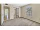 Relax in this carpeted bedroom filled with natural light from the window at 1048 Plantation Dr # 12, Kissimmee, FL 34741