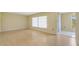 Open living room with sliding door access to outdoor patio at 1048 Plantation Dr # 12, Kissimmee, FL 34741