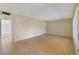 Spacious living room featuring hardwood floors and neutral paint at 1048 Plantation Dr # 12, Kissimmee, FL 34741