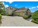 Spacious three-car garage and brick paved driveway complements this lovely home at 1065 Cavan Dr, Apopka, FL 32703