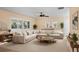 Bright living room with a large sectional sofa, neutral decor, and ample seating at 1150 Virginia Avenue, Altamonte Springs, FL 32701