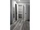Walk-in closet featuring built-in shelving and clothing storage at 1180 Baton Dr, Deltona, FL 32725