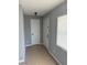 Inviting entryway with tile floors, white doors, and a window that offers natural light at 1180 Baton Dr, Deltona, FL 32725