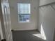 Carpeted walk-in closet with window and wire shelving at 1235 Island Slough Ln, Davenport, FL 33837