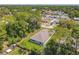 A high angle view of the property showing the backyard, trees, fencing, and the neighborhood at 1314 Victory Palm Dr, Edgewater, FL 32132