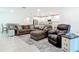 Spacious living room with comfortable seating and tile flooring, open to the kitchen at 1314 Victory Palm Dr, Edgewater, FL 32132
