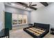 Bedroom featuring decorative ceiling beams, neutral carpeting, and green-painted door at 13798 Walcott Ave, Orlando, FL 32827