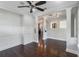 Dining room with white trim, wainscoting, hardwood flooring, and abundant natural light at 13798 Walcott Ave, Orlando, FL 32827