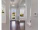 Inviting foyer with hardwood floors and a view of the front yard, creating a warm and welcoming entrance at 13798 Walcott Ave, Orlando, FL 32827