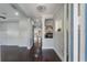 Spacious foyer with hardwood floors leads to the kitchen and living areas, creating an open and inviting atmosphere at 13798 Walcott Ave, Orlando, FL 32827