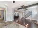 Open floorplan living room featuring hardwood floors and staircase at 13798 Walcott Ave, Orlando, FL 32827