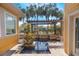 Back patio oasis featuring a water feature, perfect for outdoor entertaining and relaxation at 13798 Walcott Ave, Orlando, FL 32827
