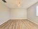 Bright bedroom featuring hard wood floors and a chandelier at 14521 Tanja King Blvd, Orlando, FL 32828