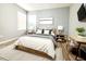 Bedroom featuring an updated desk and minimalist decor at 14521 Tanja King Blvd, Orlando, FL 32828