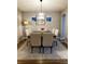 Dining room featuring a modern light fixture and a stylish rug at 14521 Tanja King Blvd, Orlando, FL 32828
