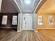 Inviting foyer with wood floors, neutral paint, and lots of natural light at 14521 Tanja King Blvd, Orlando, FL 32828