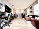 Gaming room setup featuring desks, gaming stations, and comfortable seating at 14521 Tanja King Blvd, Orlando, FL 32828